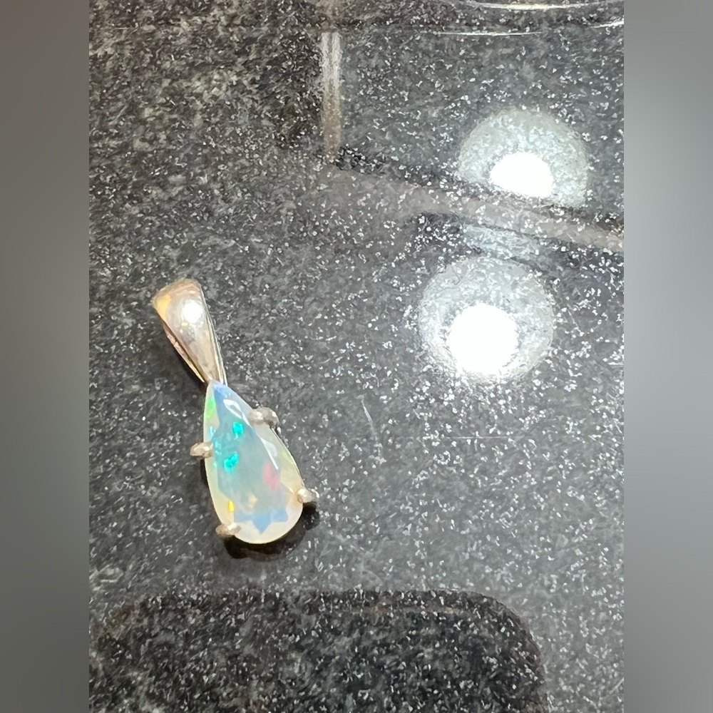 Pear shaped opal pendant in sterling silver